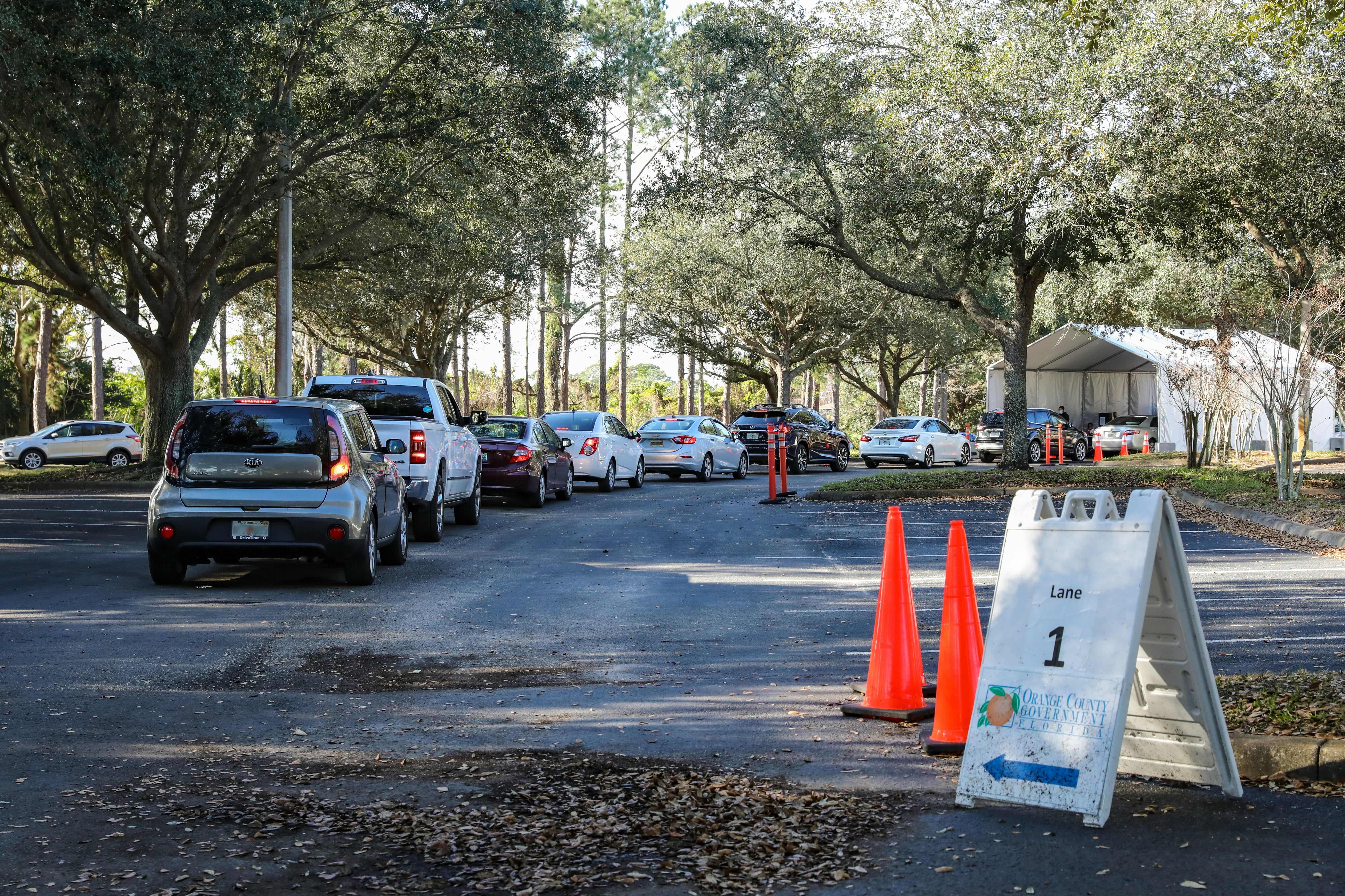 cars parked on parking lot during daytime